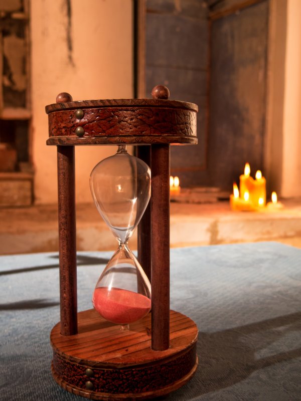 Hourglass with red sand