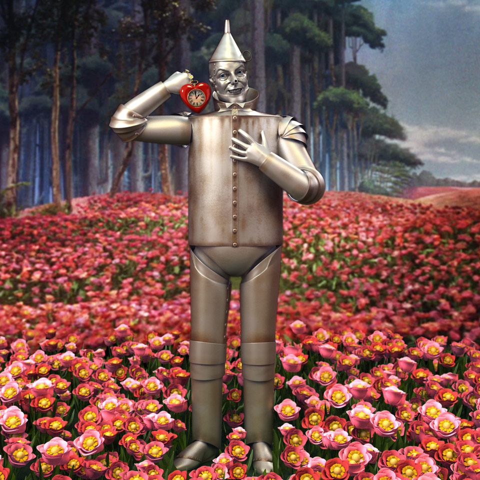 Tin Man holding an apple in the in the meadow