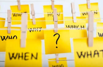Sticky notes hanged with questions of asking inclusive leadership